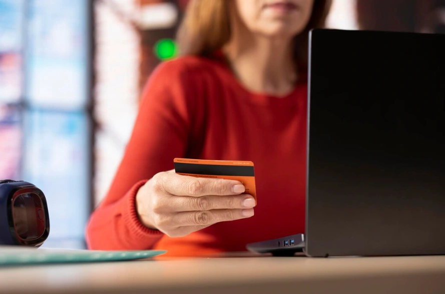 Women pay with debit card